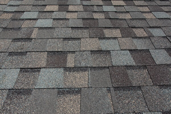 a finished installation of architectural shingle roofs