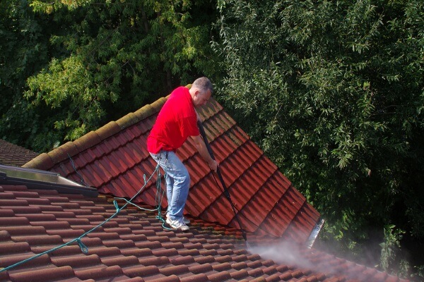 clay tile roofs getting cleaned